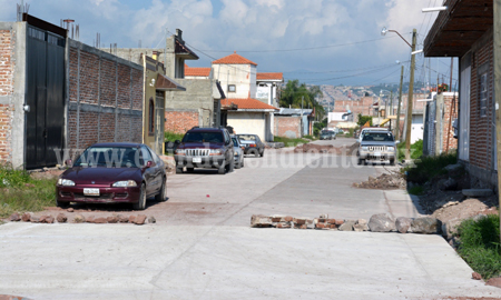 Al servicio de la comunidad la pavimentación de la calle López Mateos