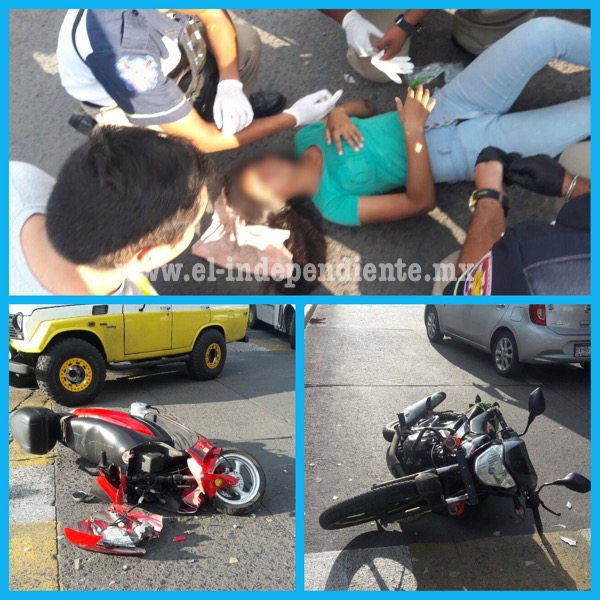 Dos hermanos heridos en choque de motocicletas
